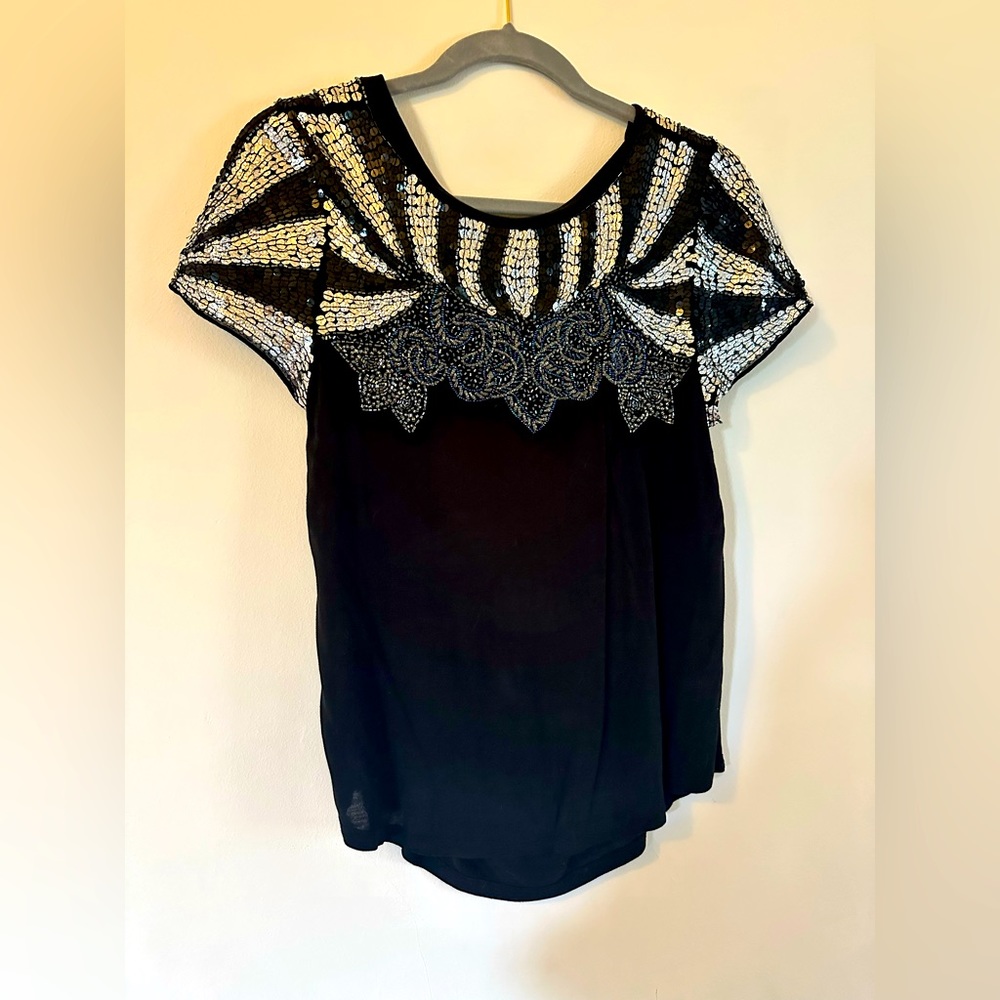 embroider top with open black